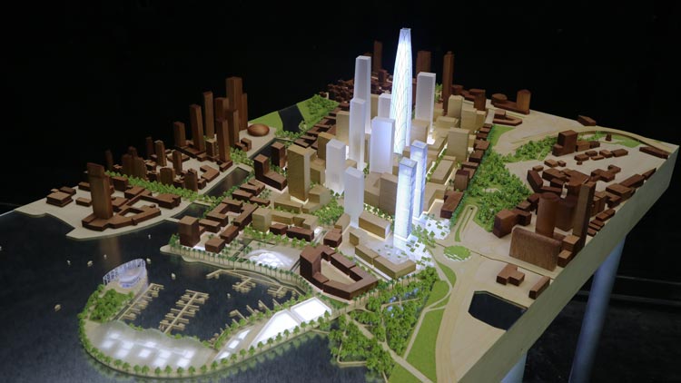 说明了SOM在港口城市科伦坡项目的设计概念，使用光/暗木材